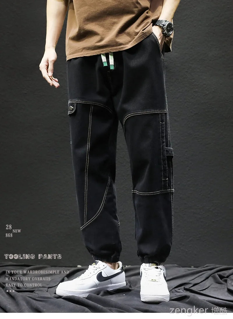 Men's drawstring jeans spring and autumn loose work pants fashion laced Harun plus size casual pants tide 140kg