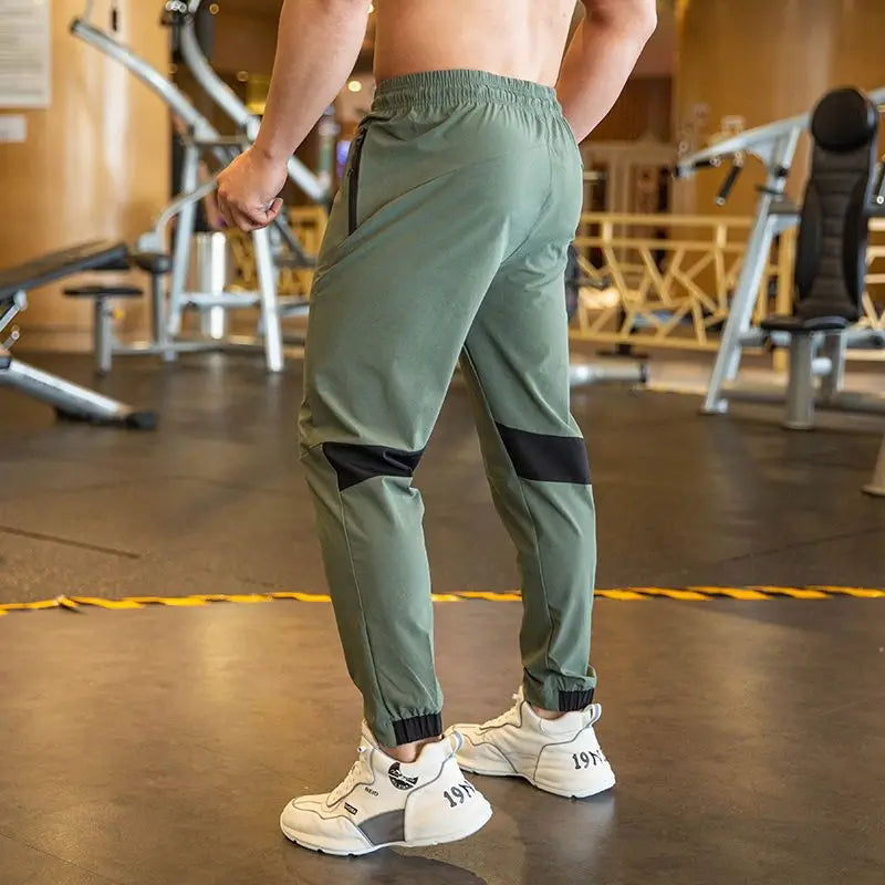 2024 Summer Thin Style Ice Silk Fabric Motion Trousers Man Solid Color Elastic Waist Quick Drying Loose Bodybuilding Sweatpants