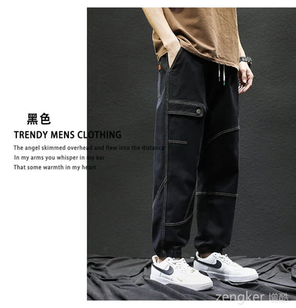 Men's drawstring jeans spring and autumn loose work pants fashion laced Harun plus size casual pants tide 140kg